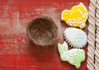 Colorful easter cookies on a wooden background