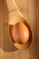 Egg on a wooden spoon