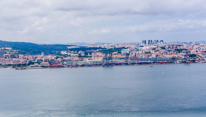 Panoramic view from Almada across the Tagus River at Lisbon, Portugal