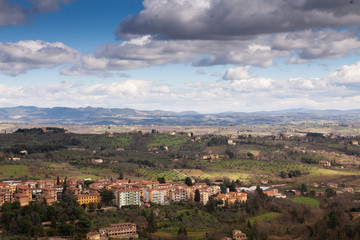 Fototapeta premium Top view of the famous Italian city of Siena on a cloudy day