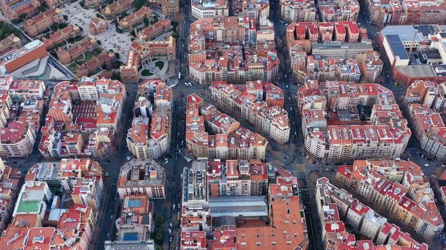 Aerial drone video of Barcelona Spain. Streets of Expansion District. hospital de sant pau. Video footage. Car traffic