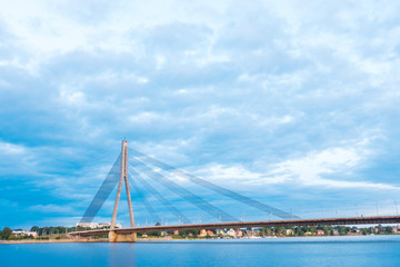 Fototapeta premium RIGA, LATVIA - August 28, 2017: The Vansu Bridge in Riga is a cable-stayed bridge that crosses the Daugava river in Riga