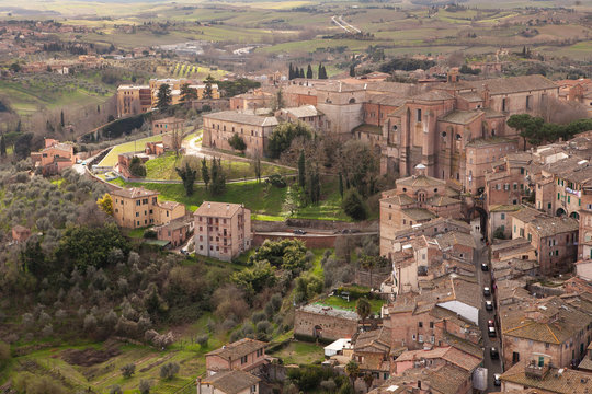 Fototapeta Top view of the famous Italian city of Siena on a cloudy day