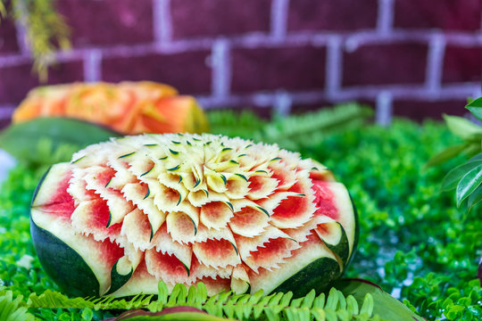 Colorful and beautiful watermelon carved or sculpted on green leaf