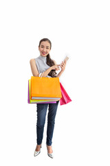 Beautiful asian girl carrying shopping bags. Shopping woman smiling. Beautiful Asian girl. young shopper.