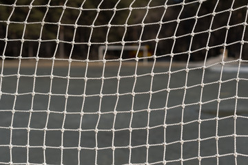 Football gates net. Empty football field with old gates. © Vasilii Bond