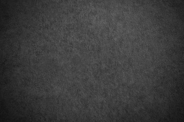 Fototapeta na wymiar Dark gray flooring tile. Texture of black granite. Gradiental horizontal background.