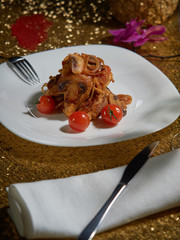 Fresh beef with fried mushrooms.