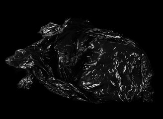 Torn and cut nylon bag isolated on  black background and texture, clipping path 