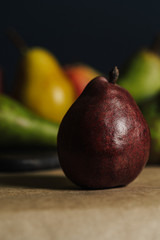 Fresh pears. Pears harvest. Fruit background. Fresh organic pears on old sacking. Nature concept. Dark mood. Close up.