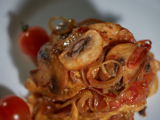 Fresh beef with fried mushrooms.