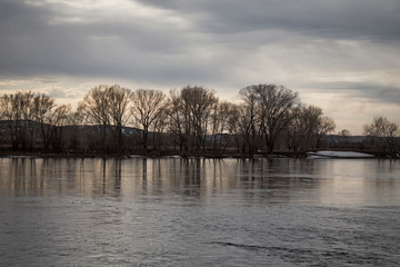 Irtysh river. Spring landscape. River. Grunge landscape. 