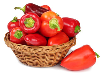 Fototapeta na wymiar Sweet pepper in a basket isolated on a white background