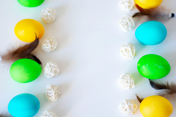 Easter eggs multicolored isolated on white background. Minimal easter concept. Happy easter card with copy space for text. Top view, flat.