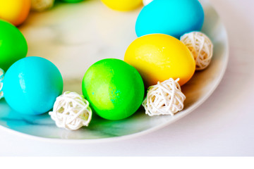 Easter eggs multicolored isolated on white background. Minimal easter concept. Happy easter card with copy space for text. Top view, flat.