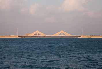 A beautiful view of Bahrain skyline during evening hours at sunset