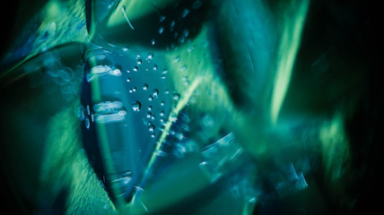 Green blue abstract geometric glass with water babbles. Abstract pictorial background.