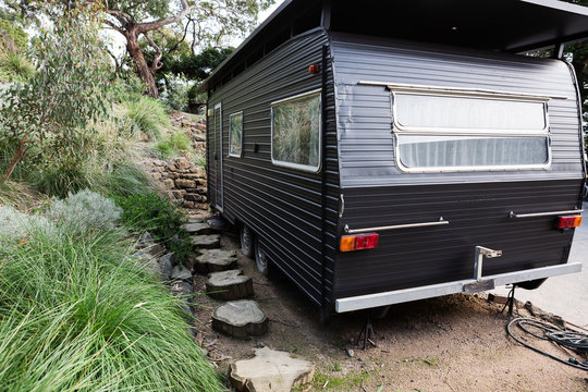 Steps leading to a permanent retro caravan
