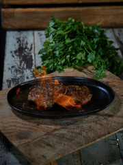 Large pieces of beef with fire.