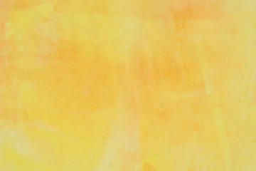 yellow watercolor pastel painted on paper background texture