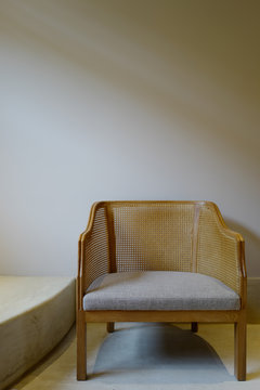 empty chair against wall in room