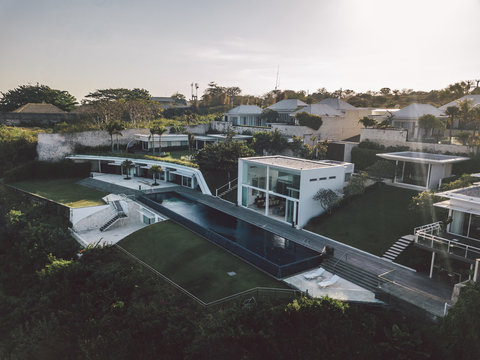 aerial panorama of a luxury property with huge swimming pool