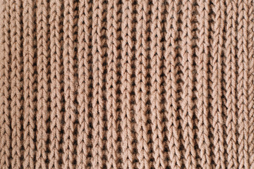 Knitted background. Knitted texture. Knitting pattern of wool. Knitting. Background. close-up