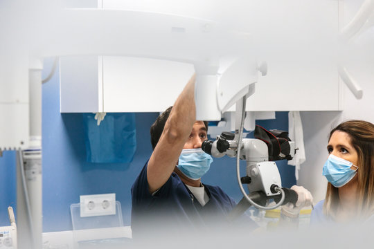 Dentists working on patient