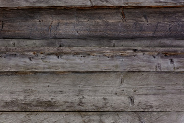 Gray wall, wooden texture of old beams