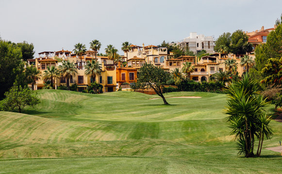 Golf course beisdes a rural town