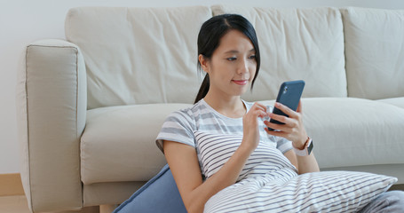 Woman use cellphone online