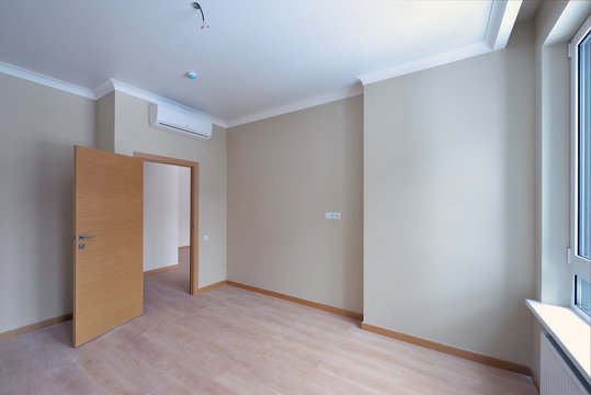Empty room after repairs in an apartment building
