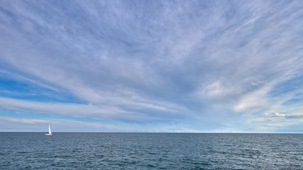Mediterranean sea landscape with blue sky and clouds