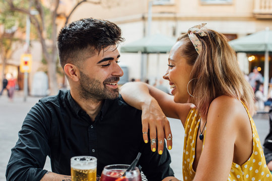 Couple Having Drinks Outside