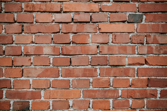 Background texture of a red clay brick wall