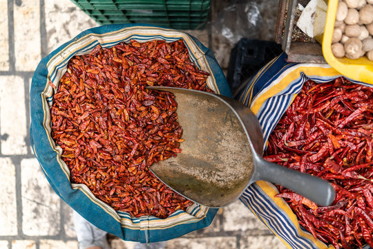 Fresh and colorful spices sold in an open air market while sightseeing in Tel Aviv, Israel.