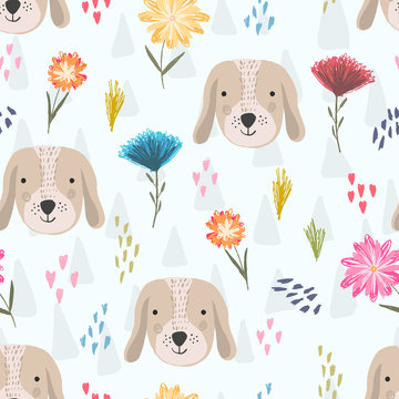 Cute seamless pattern with cartoon colorful dog heads, pink hearts and colorful childish flowers. Funny hand drawn domestic puppy texture for kids design, wallpaper, textile, wrapping paper