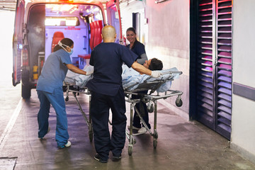 Ambulance workers and patient