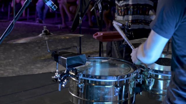 A drummer at a show.