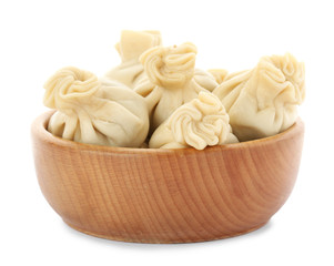 Bowl with tasty dumplings isolated on white