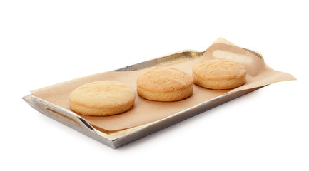 Tray with cookies for Islamic holidays isolated on white. Eid Mubarak