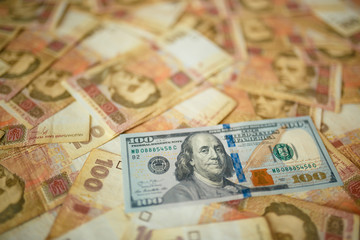 Obraz na płótnie Canvas dollars euro hryvnia banknotes background, close up