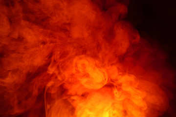 Plakat Imitation of bright flashes of orange-red flame. Background of abstract colored smoke.