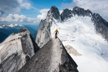 Man mountain climbing in Bugaboo Provincial Park, British Columbia, Canada