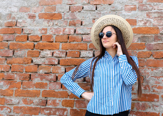 portrait of a girl with sunglasses and hat