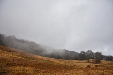 Misty mountains landscape in the morning