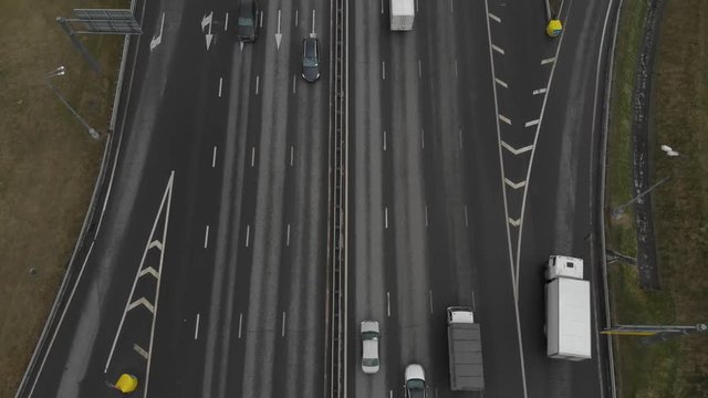 Top view of a major road in the city. Top view of the road junction. The movement of the camera from the road to the road junction. Moscow, MKAD. Aerial view 4K