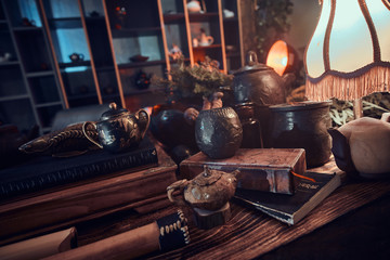 Set of accessories, ceramic cups and teapots, dry herbal leaves, all for making a natural delicious aromatic tea. Traditional Asian tea ceremony