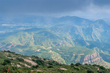 Hazy unusual mountains Fog on the mountain Montserrat Monastery, Spain