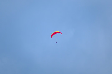 Tandem paragliders flying in the sky